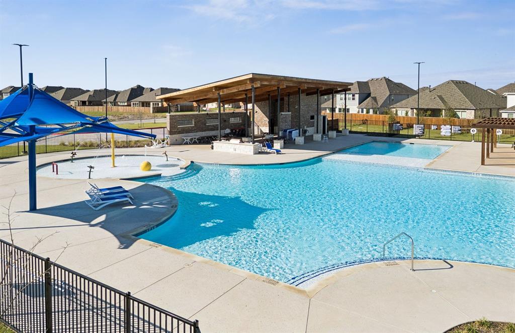 1608 Kendell Street Anna, TX 75409 - Photo 27 of 28 a view of a swimming pool and a terrace