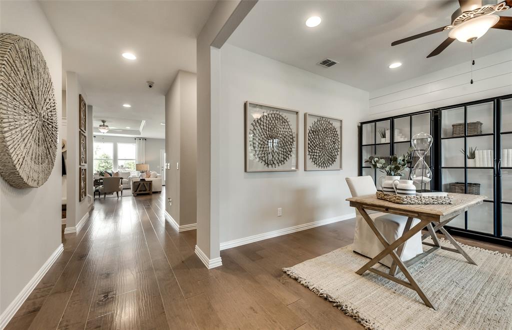 1608 Kendell Street Anna, TX 75409 - Photo 3 of 28 a living room with furniture and a table