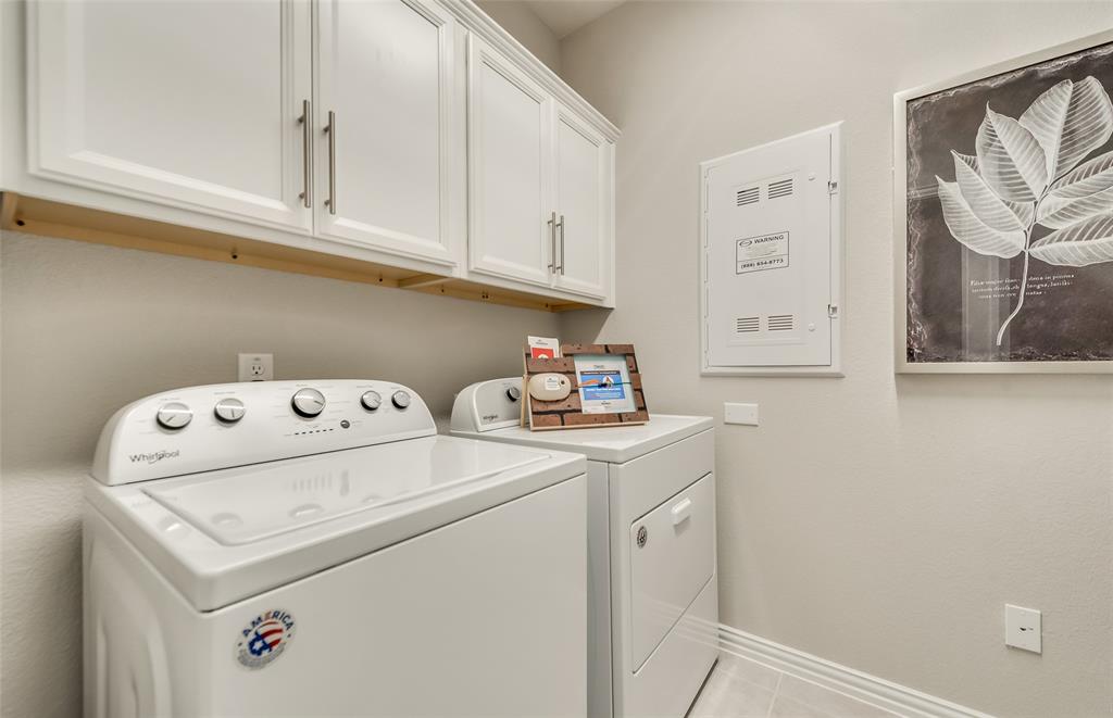 1608 Kendell Street Anna, TX 75409 - Photo 7 of 28 a utility room with dryer and washer