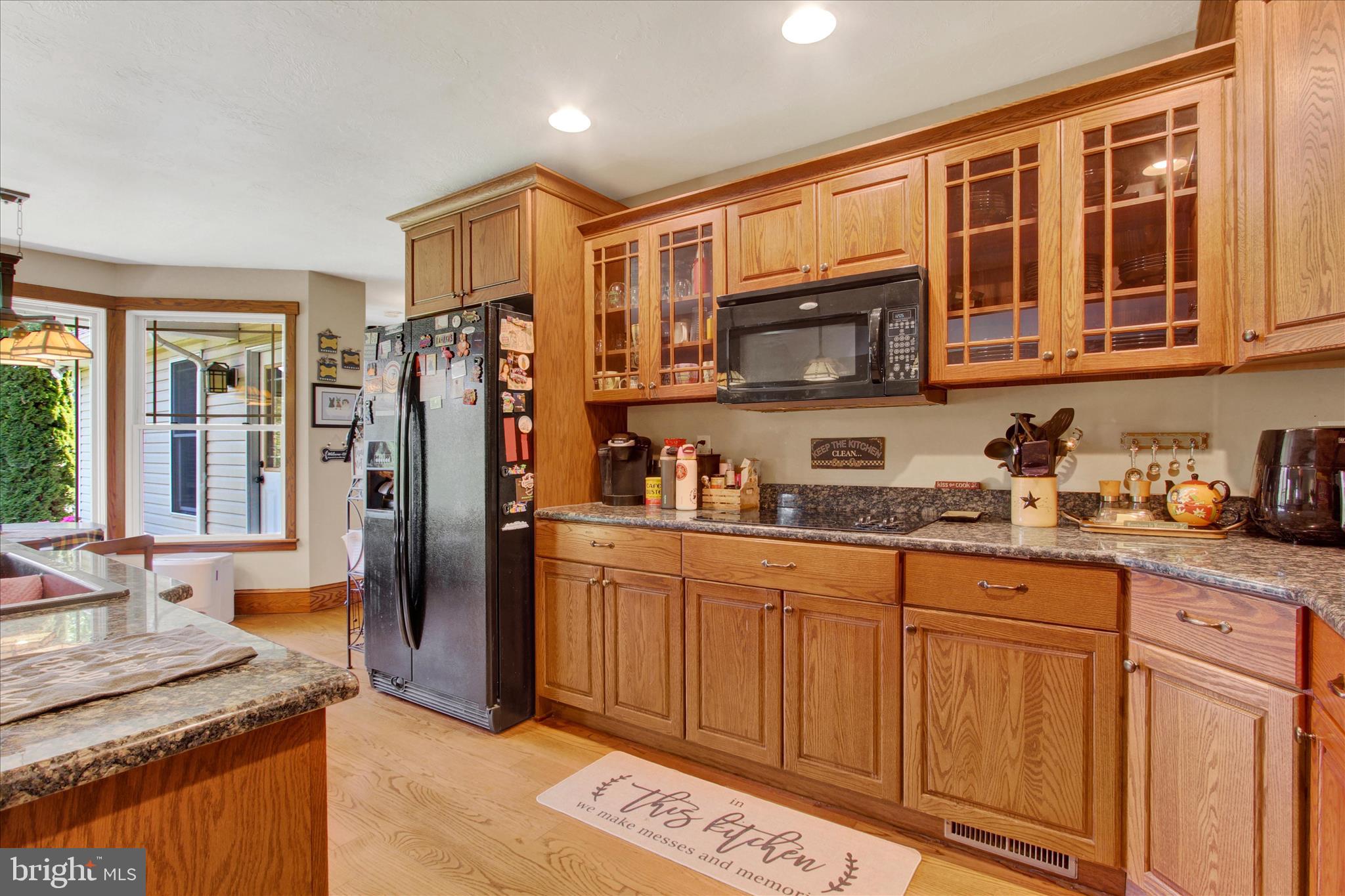 1210 White Church Road Gettysburg, PA 17325 - Photo 22 of 56 a kitchen with stainless steel appliances granite countertop a refrigerator and a sink