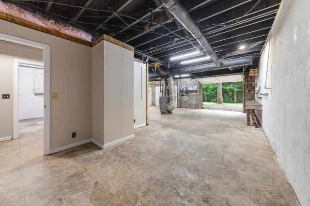 a view of a swimming pool with a yard