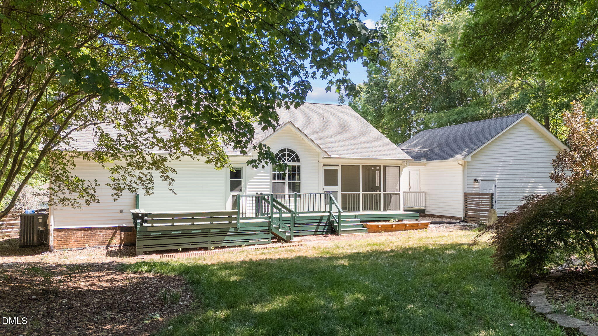 6820 Oviedo Drive Raleigh, NC 27603 - Photo 6 of 50 a view of a house with a yard