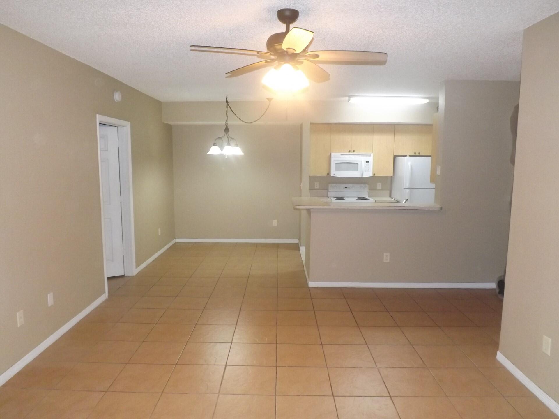 5016 Lantana Road, Unit 1103 Lake Worth, FL 33463 - Photo 4 of 14 Living Room