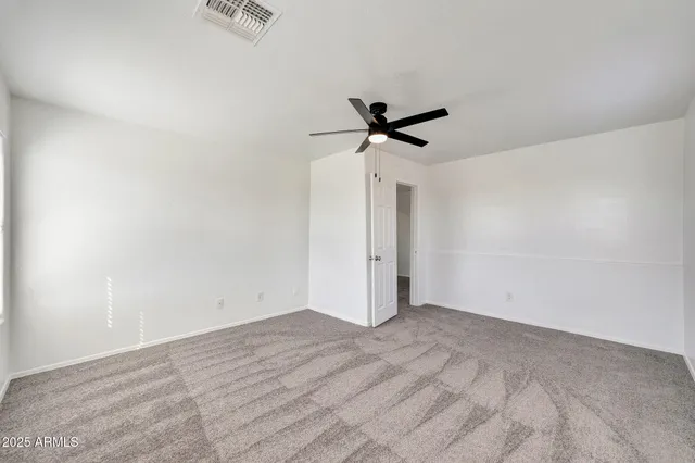 a view of a big room with wooden floor
