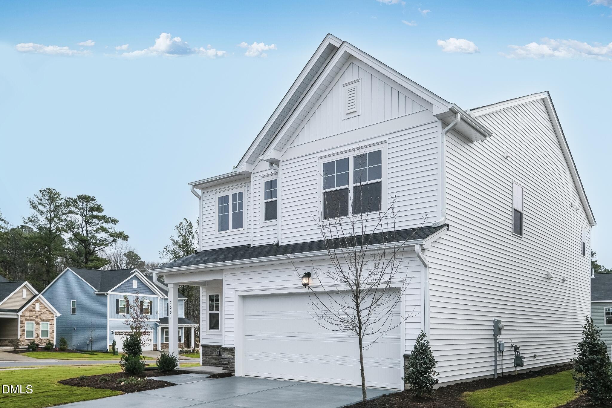 1028 Red Finch Way Angier, NC 27501 - Photo 6 of 40 a front view of a house with a yard