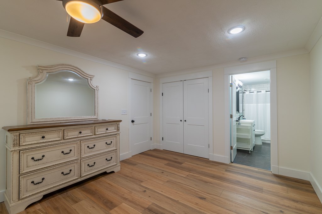 1519 1/2 16th Avenue Columbus, GA 31901 - Photo 11 of 25 a view of room with wooden floor and staircase