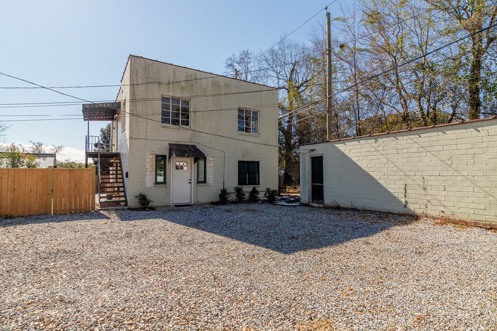 1519 1/2 16th Avenue Columbus, GA 31901 - Photo 19 of 25 a view of a house with a snow in the yard