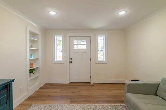 a view of livingroom with furniture and windows