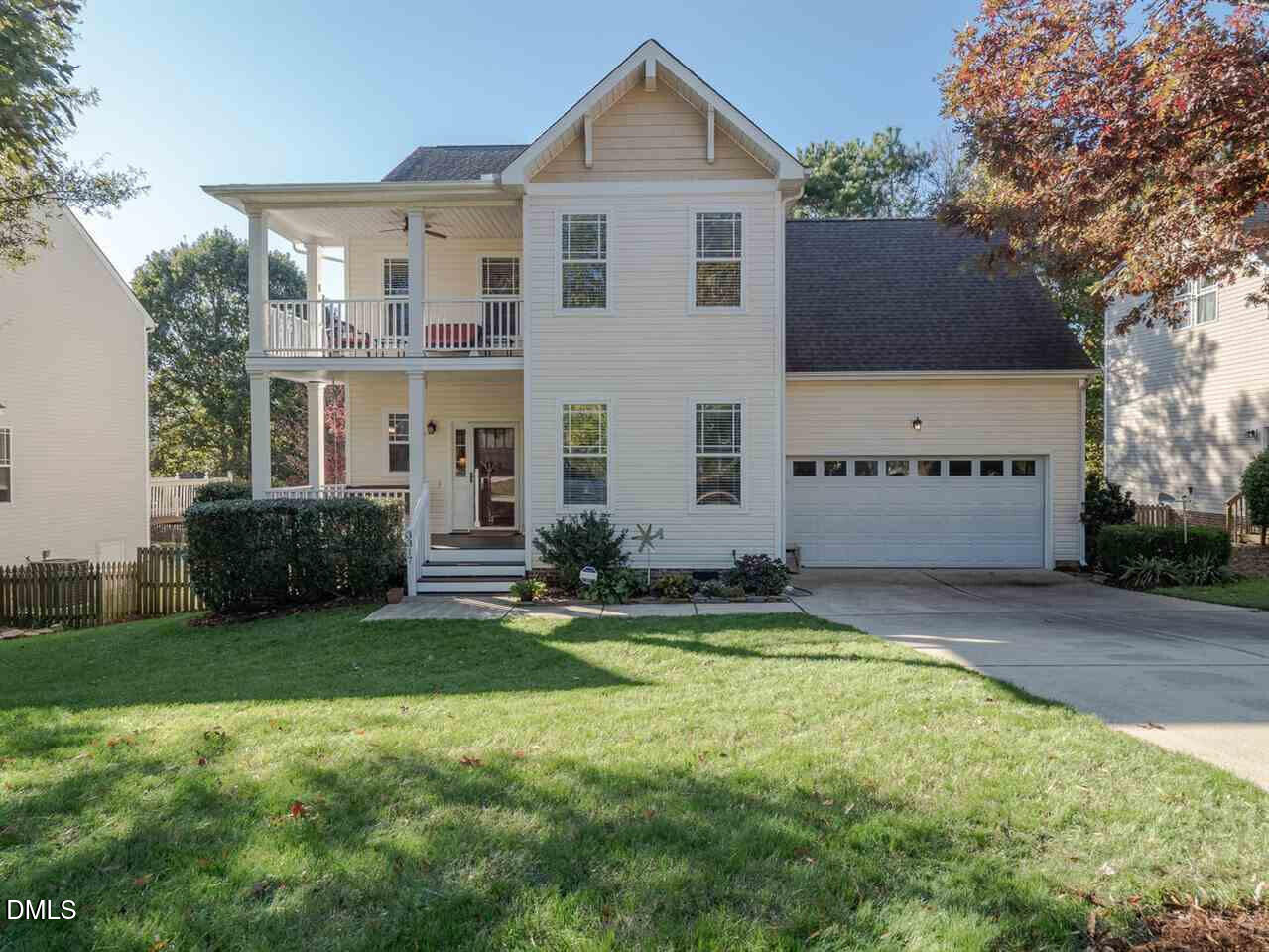 3317 Neuse Crossing Drive Raleigh, NC 27616 - Photo 4 of 36 Lovely entry--stacked porches and 2 car garage (many homes in neighborhood only have 1 car). (Pic from when they purchased...grass it not great this year with drought).