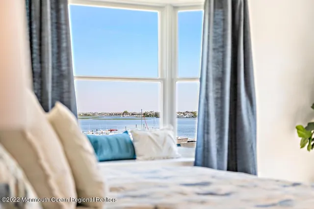a view of a balcony with furniture