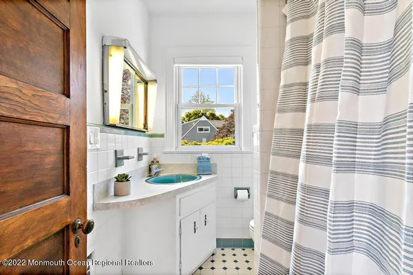 a bathroom with a sink and a bathtub