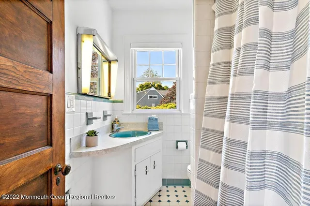 a bathroom with a sink and a bathtub