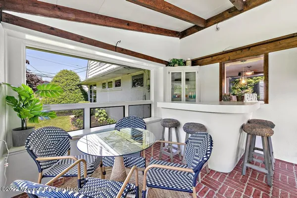 a outdoor living space with furniture and garden view