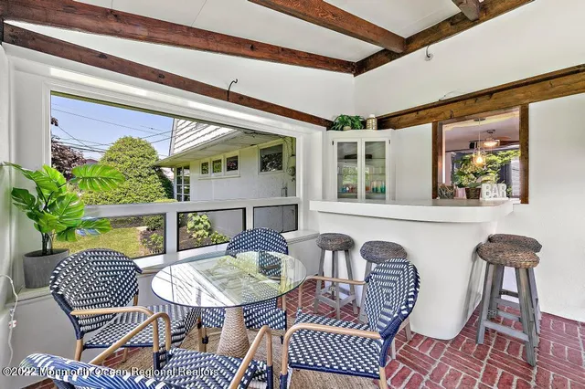 a outdoor living space with furniture and garden view
