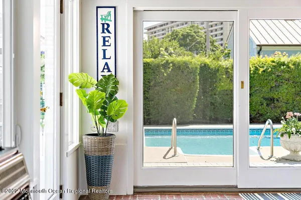 a view of balcony with patio