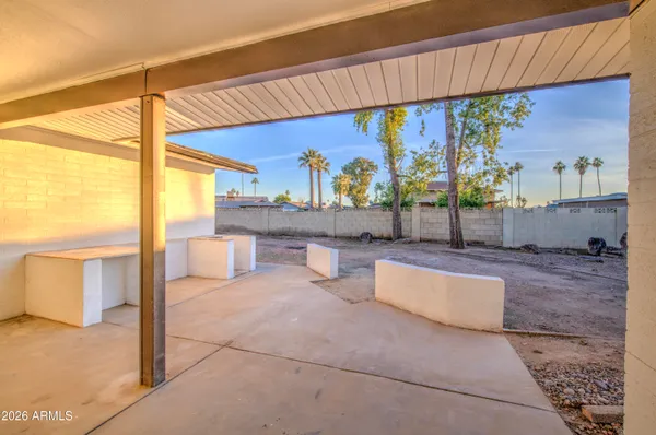 a view of a yard with an outdoor space