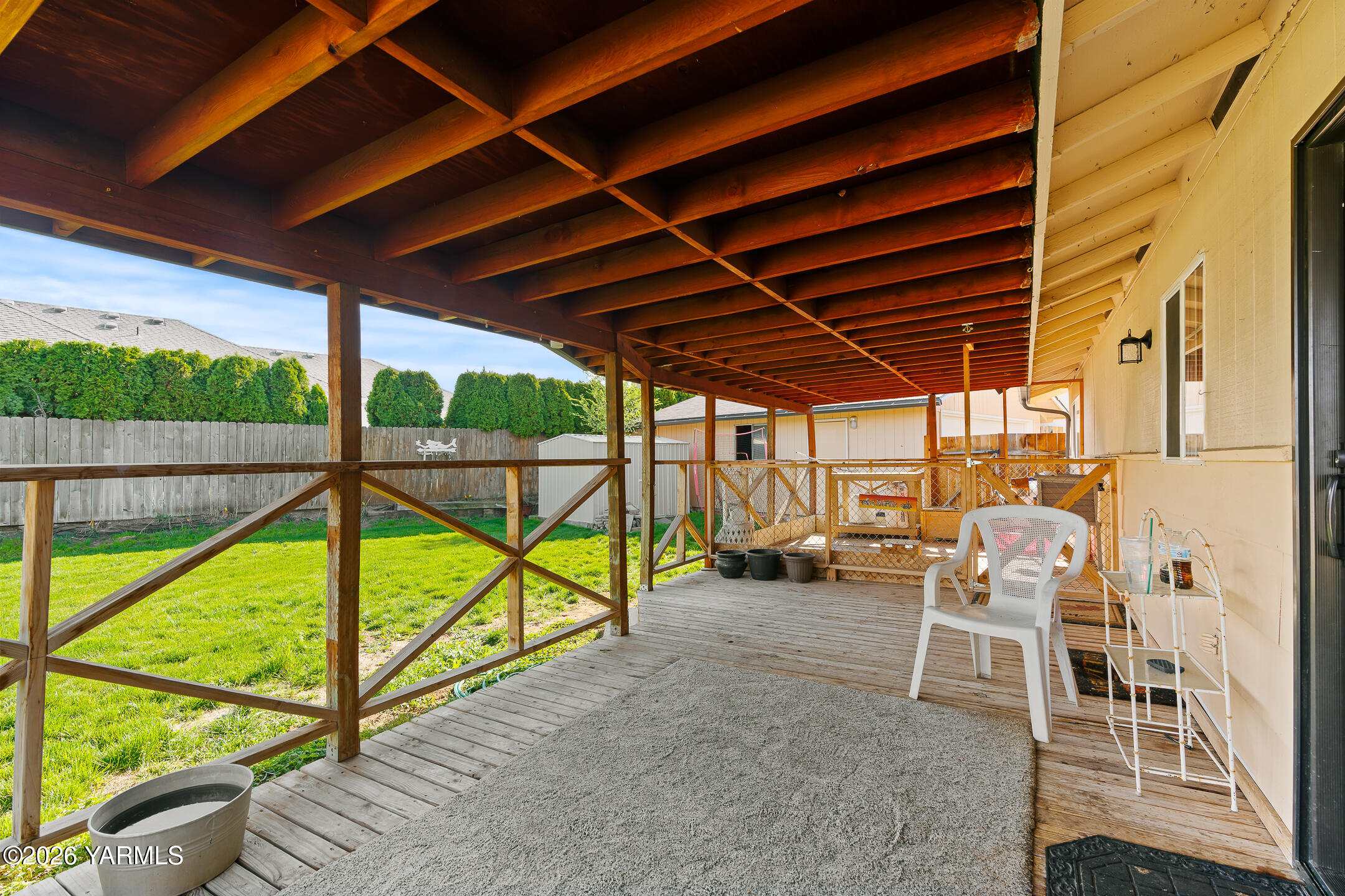 708 Daugherty Place Selah, WA 98942 - Photo 21 of 27 a view of chairs and table in balcony