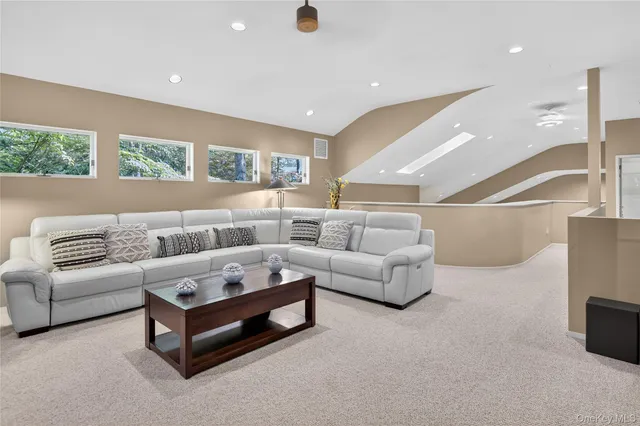 a living room with furniture and a couch