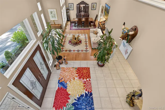 a view of living room with furniture and flowers