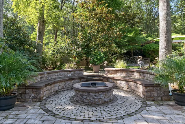 a view of a water fountain in the backyard