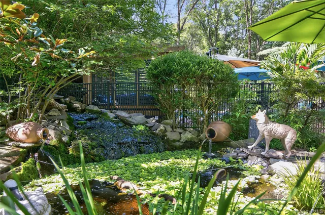 a backyard of a house with lots of green space