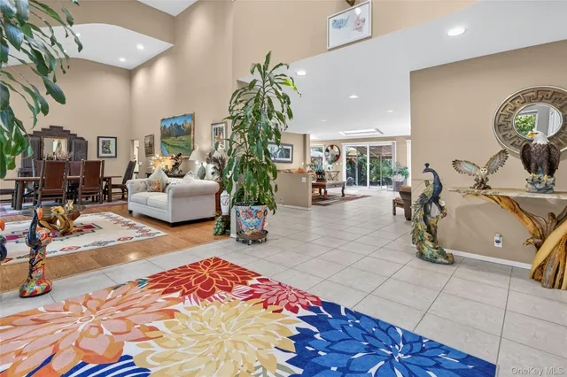 a living room with patio furniture