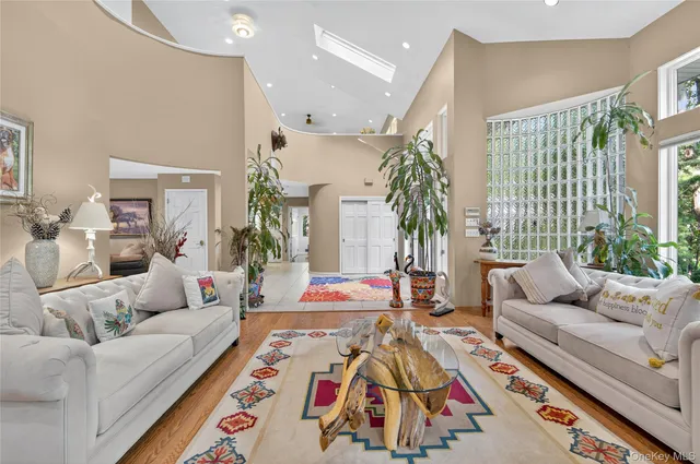 a living room with furniture and a rug