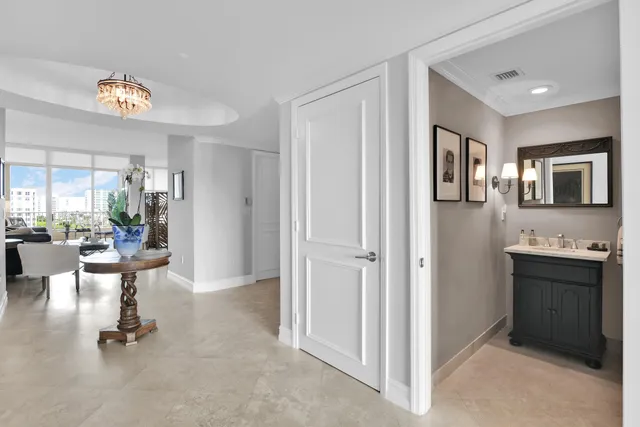 a spacious bedroom with a large bed and a large window