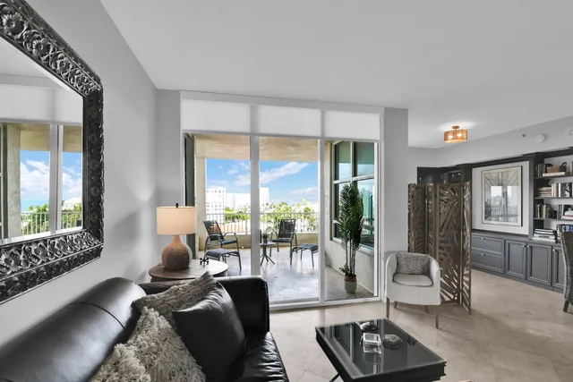 a spacious bathroom with a double vanity sink mirror and bathtub