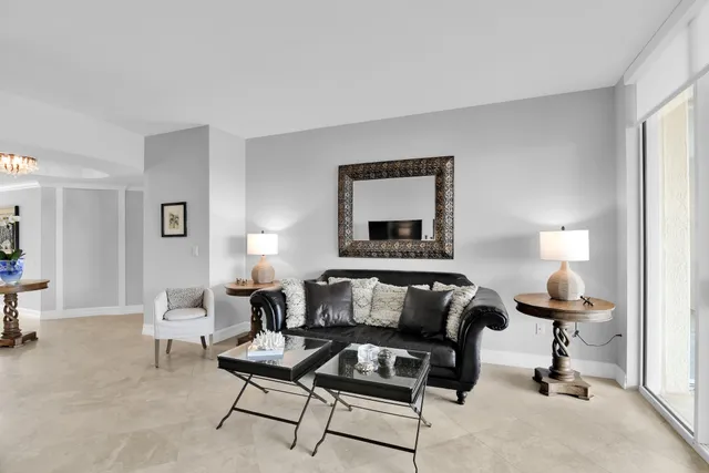 a spacious bathroom with a sink and a mirror