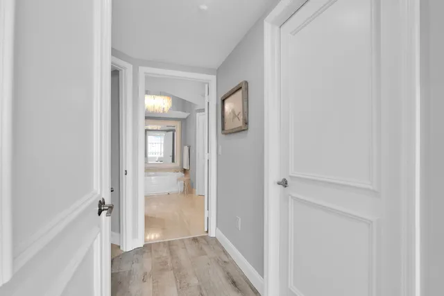 a bathroom with a glass shower door
