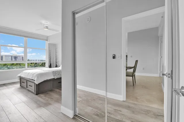 a living room with furniture a pool table and a couch