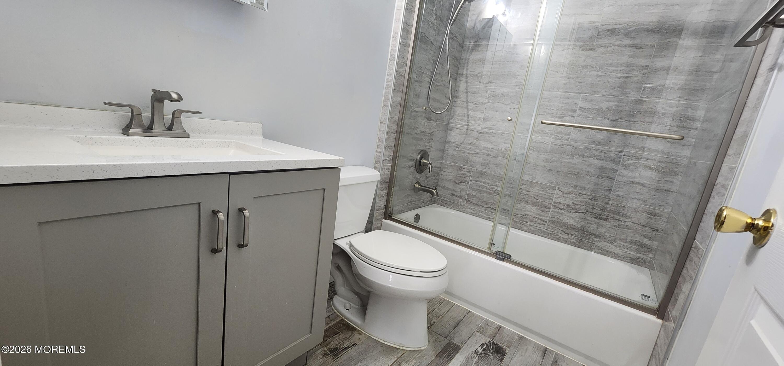117 Mid Ocean Court, Unit 1000 Howell, NJ 07731 - Photo 13 of 24 a bathroom with a sink toilet and shower