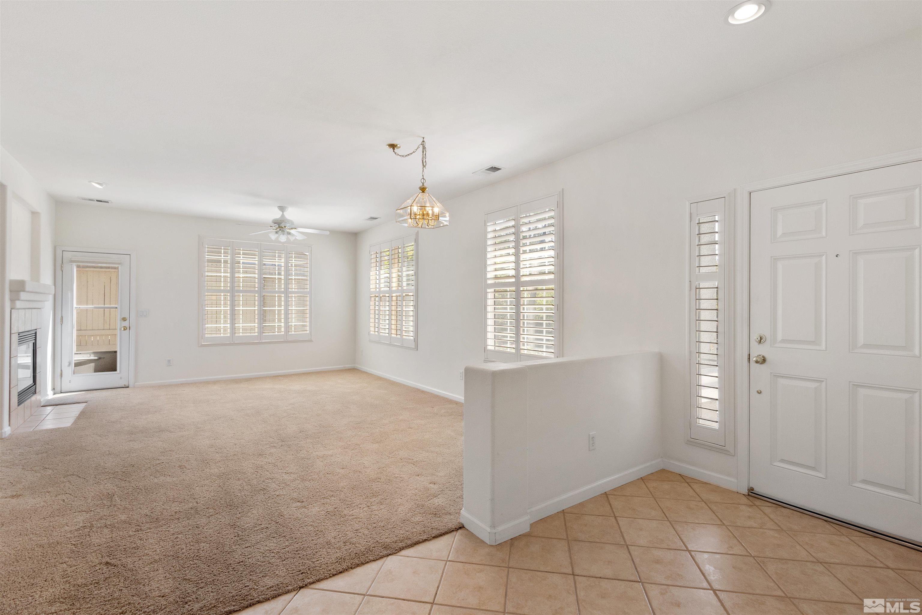10501 Iron Point Circle Reno, NV 89521 - Photo 3 of 35 a view of an empty room with a window