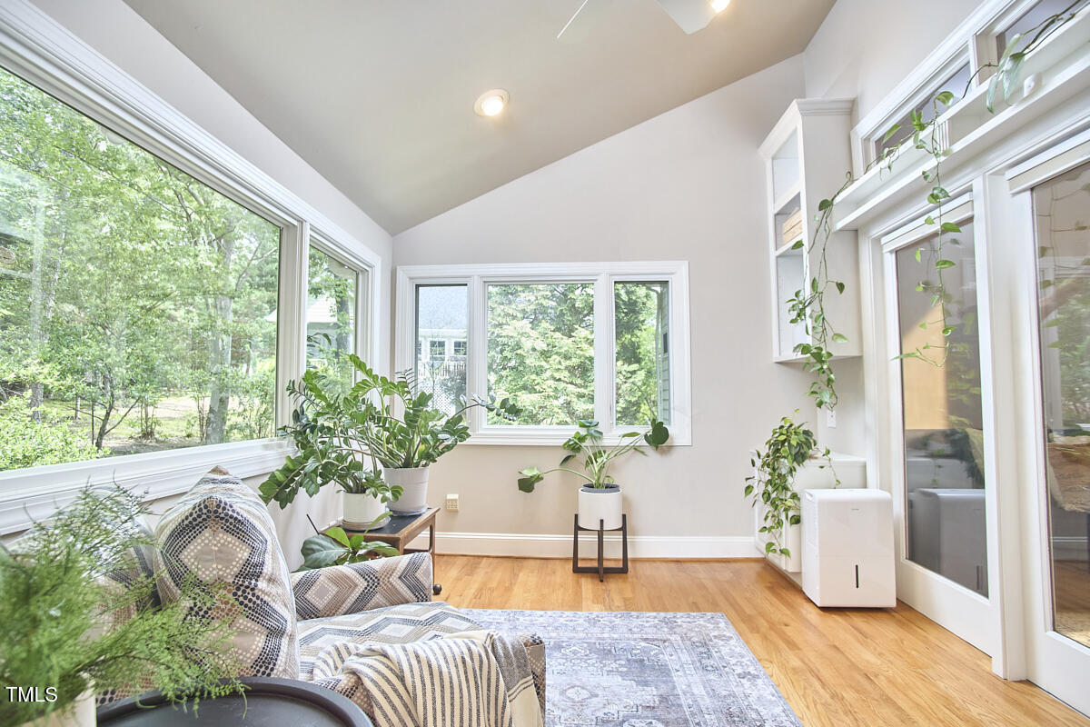 8605 Stanton Place Raleigh, NC 27615 - Photo 17 of 56 a living room with furniture and a large window