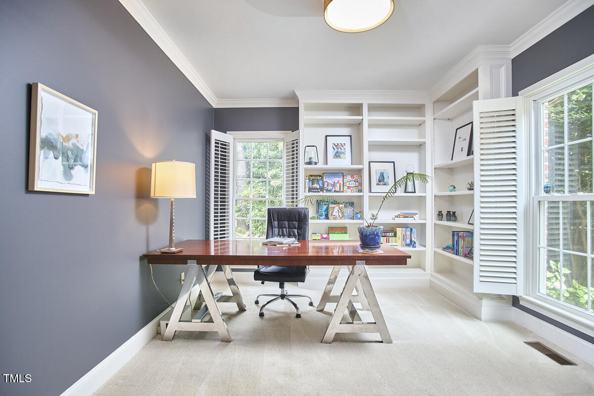 8605 Stanton Place Raleigh, NC 27615 - Photo 29 of 56 a reading room with furniture and a window