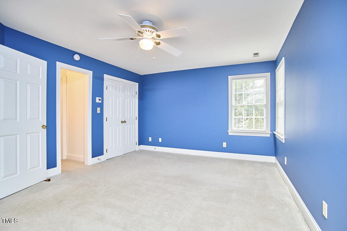 8605 Stanton Place Raleigh, NC 27615 - Photo 40 of 56 a view of an empty room with a window