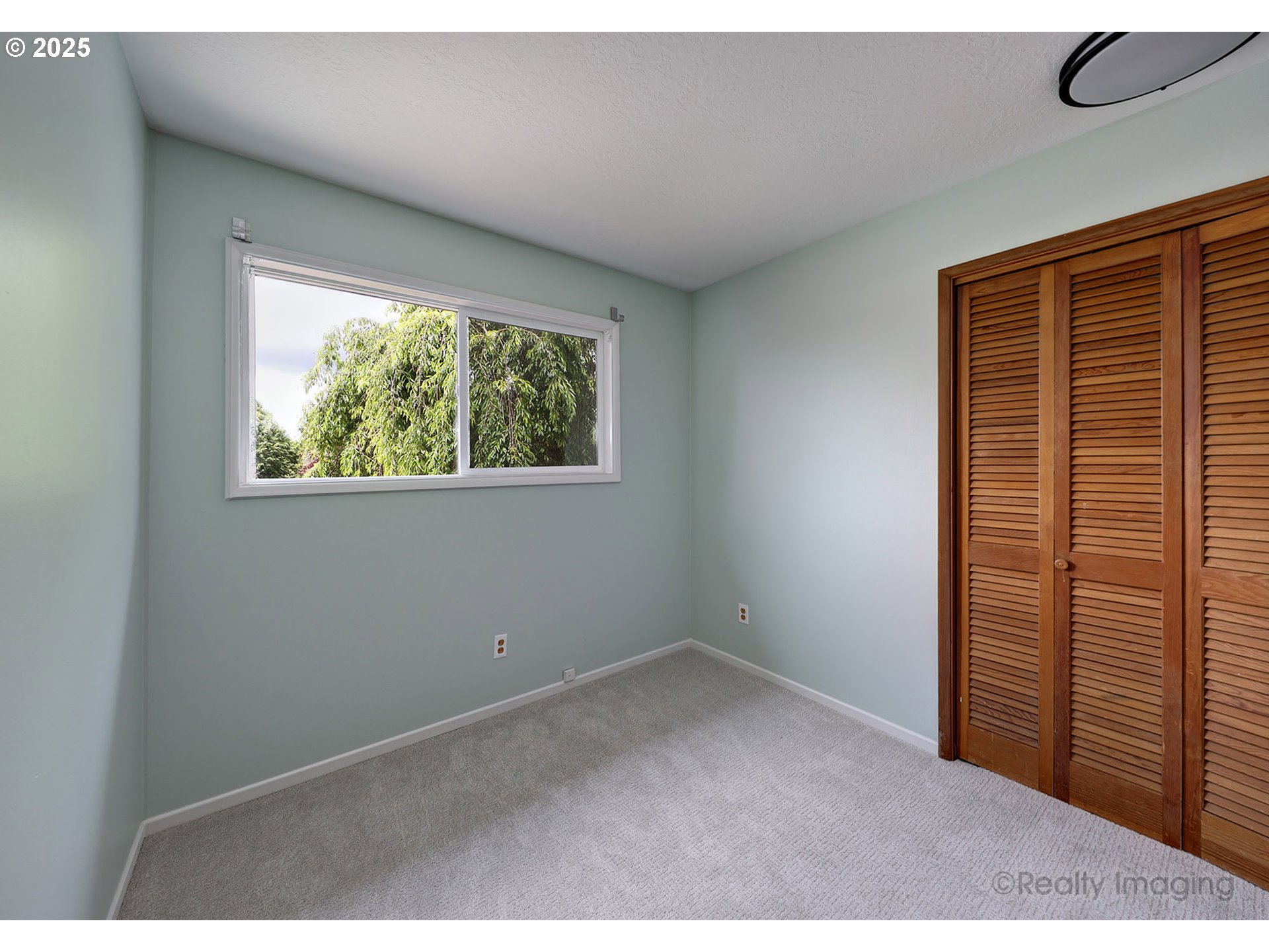 1124 Southwest Chestnut Drive Portland, OR 97219 - Photo 20 of 37 Bedroom