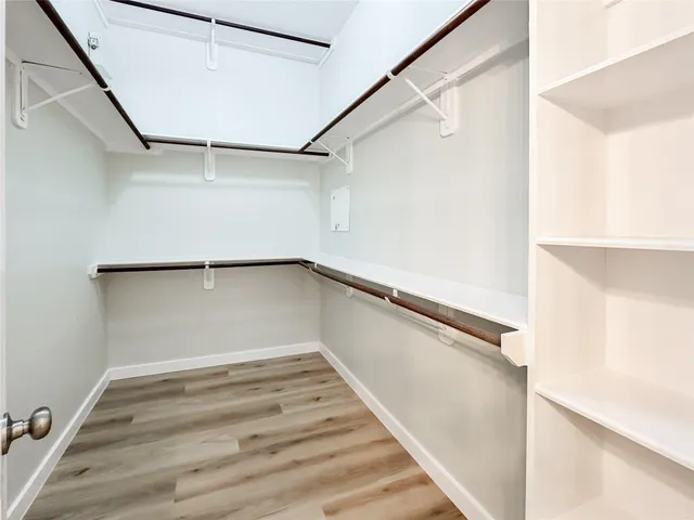 a view of an empty walk in closet