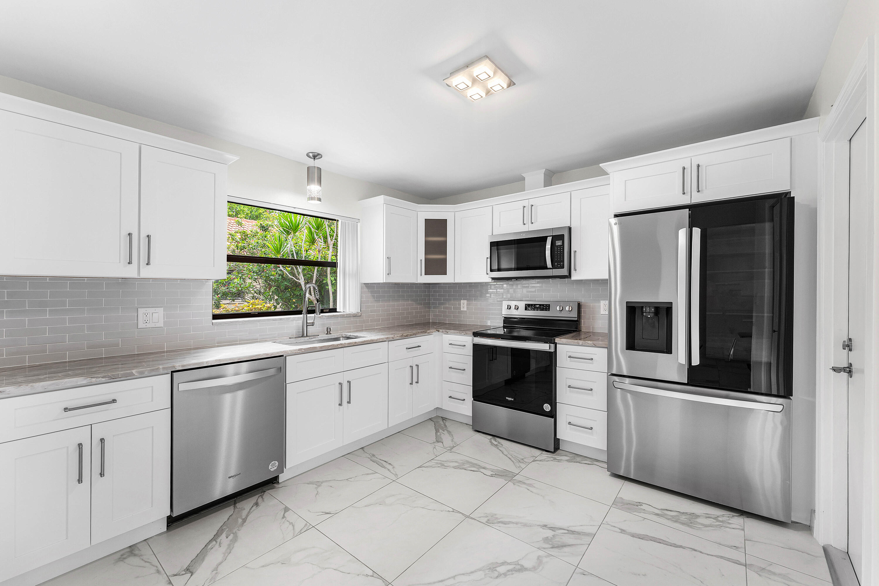 4670 Laurel Tree Road, Unit A Boynton Beach, FL 33436 - Photo 3 of 28 KITCHEN