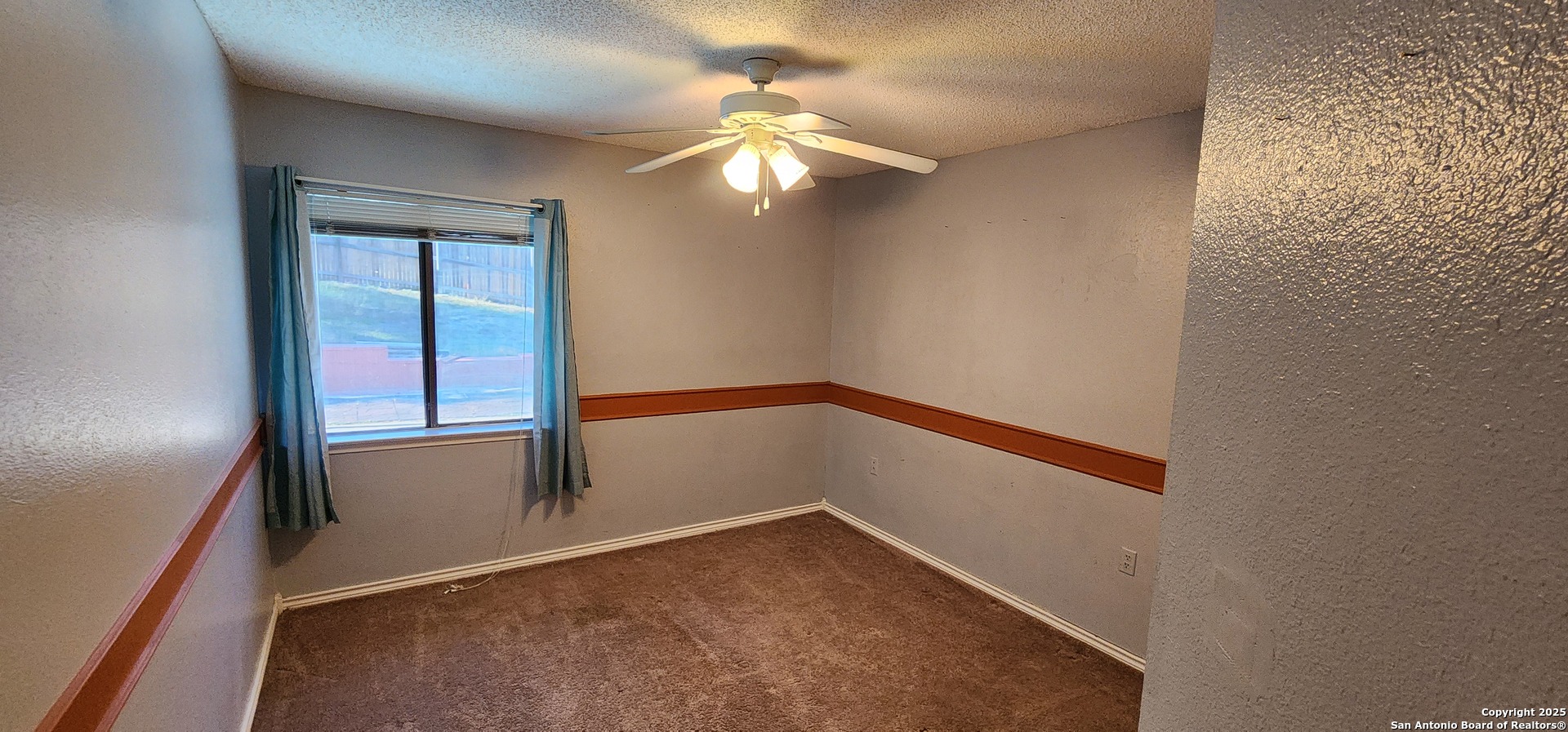 6907 Raintree Path San Antonio, TX 78233 - Photo 20 of 24 wooden floor in an empty room with a window