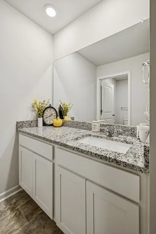 a white toilet sitting next to a shower curtain