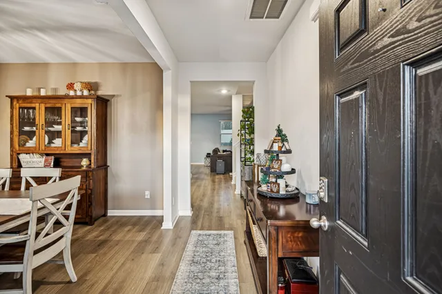 a very nice looking room with wooden floor