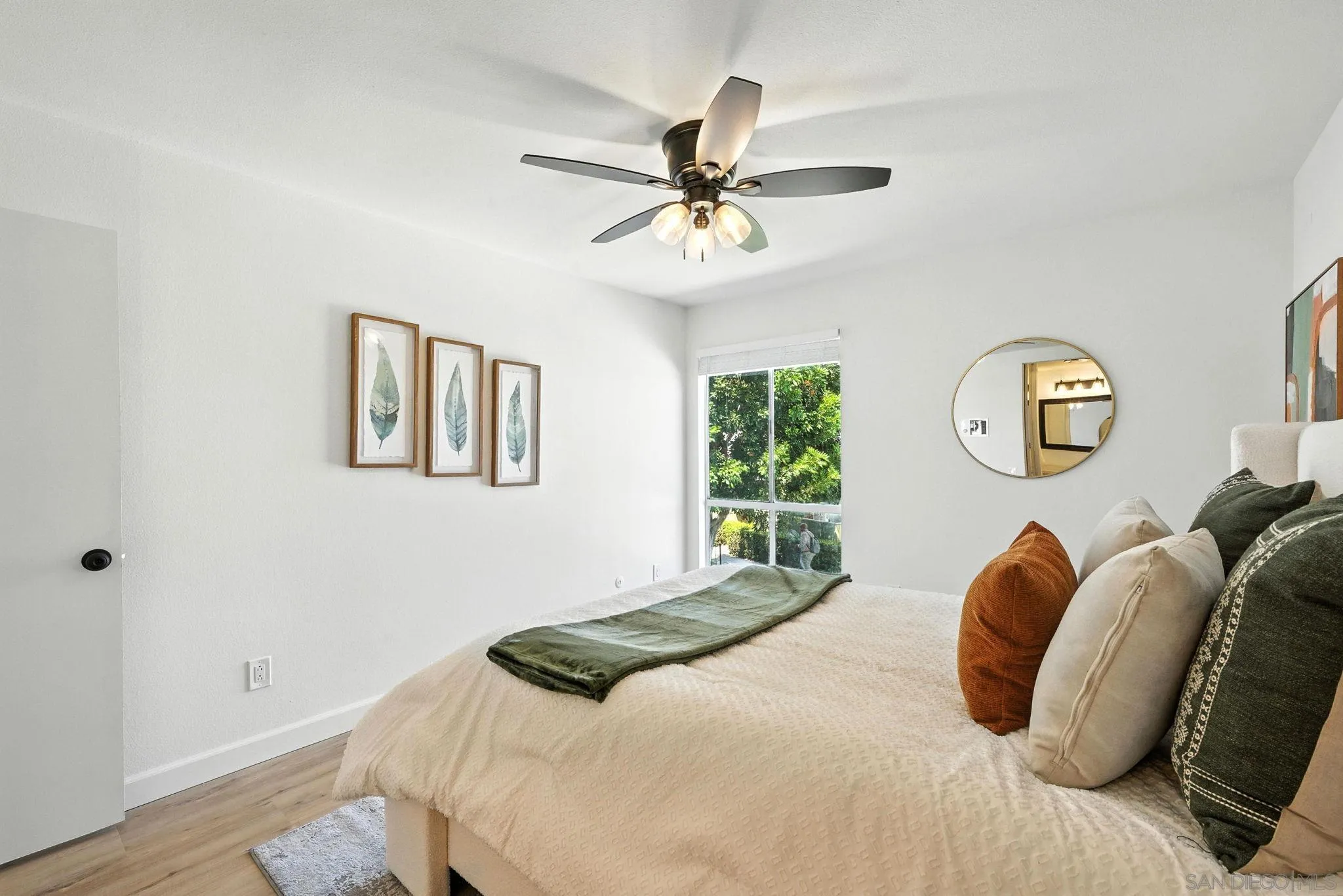 3575 Ruffin Road, Unit 204 San Diego, CA 92123 - Photo 13 of 29 a bedroom with a bed and a window