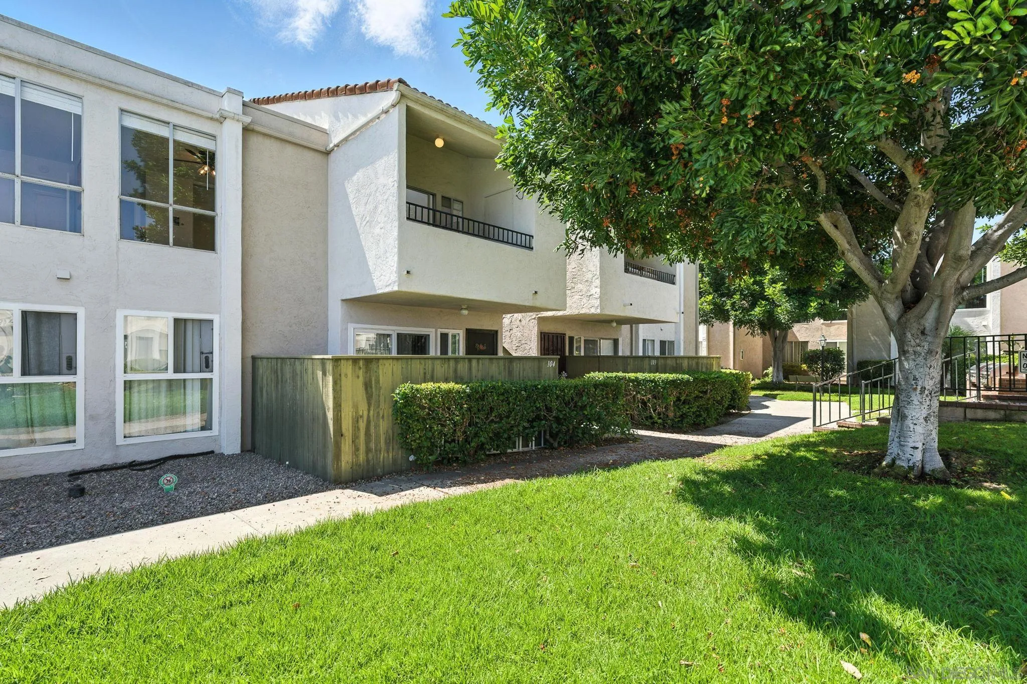 3575 Ruffin Road, Unit 204 San Diego, CA 92123 - Photo 24 of 29 a view of a house with a yard