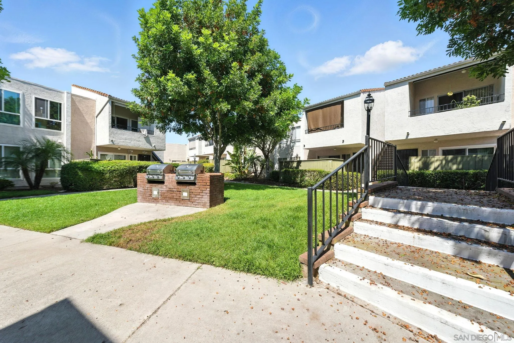 3575 Ruffin Road, Unit 204 San Diego, CA 92123 - Photo 29 of 29 a view of a house with a yard
