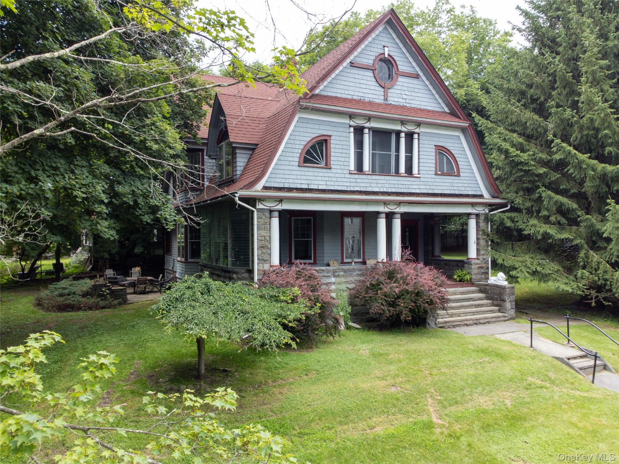 12 Highview Avenue Callicoon, NY 12723 - Photo 1 of 39 a front view of a house with a garden