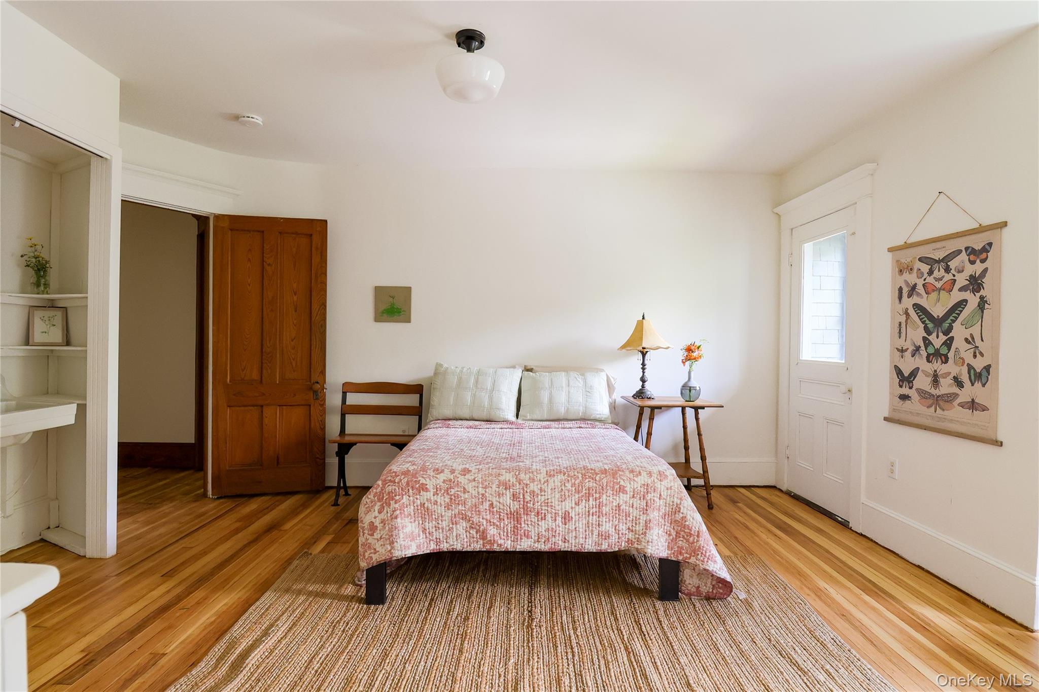12 Highview Avenue Callicoon, NY 12723 - Photo 27 of 39 a bedroom with a bed and a table