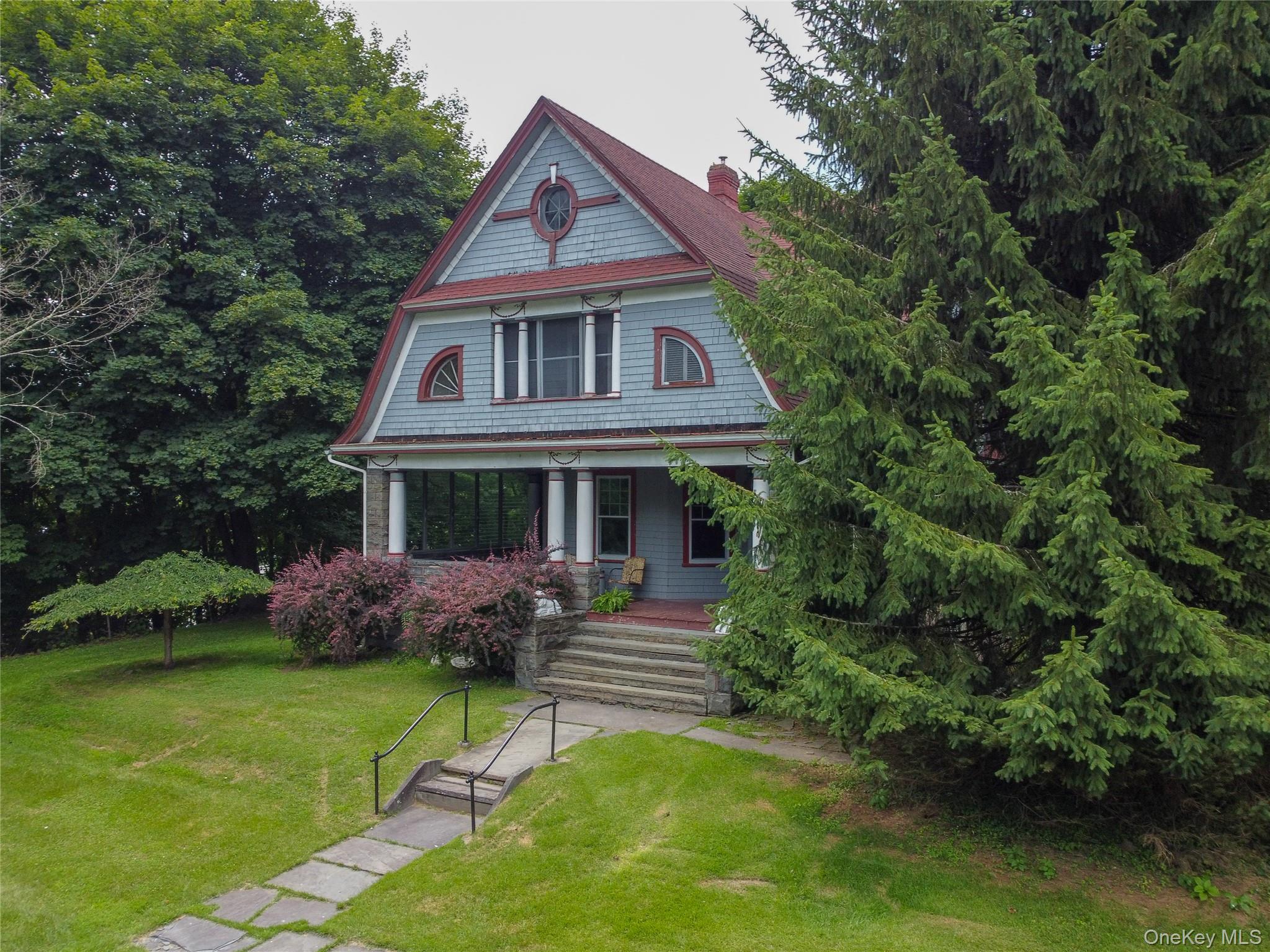 12 Highview Avenue Callicoon, NY 12723 - Photo 34 of 39 a front view of a house with garden