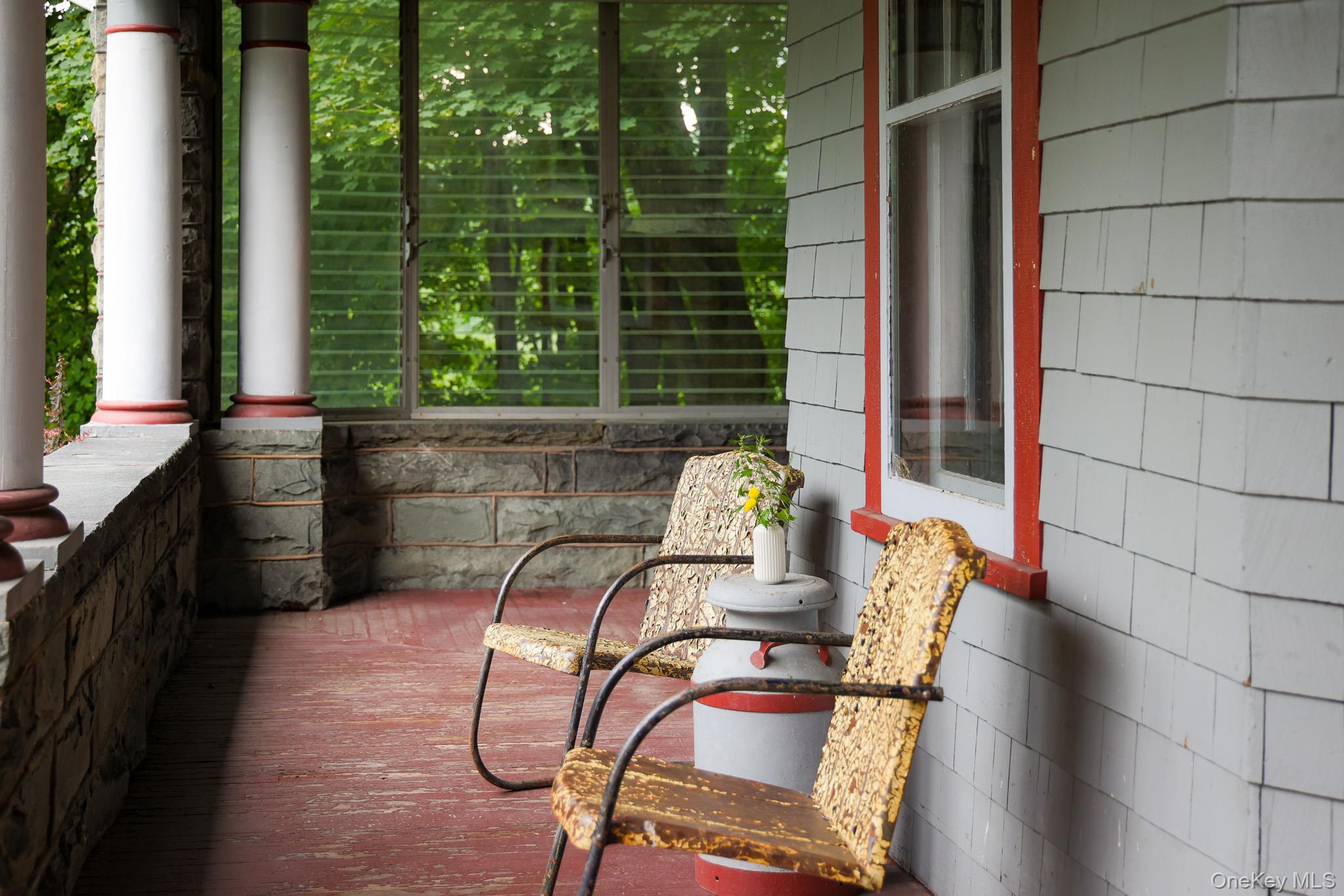 12 Highview Avenue Callicoon, NY 12723 - Photo 37 of 39 a table and chairs in a balcony